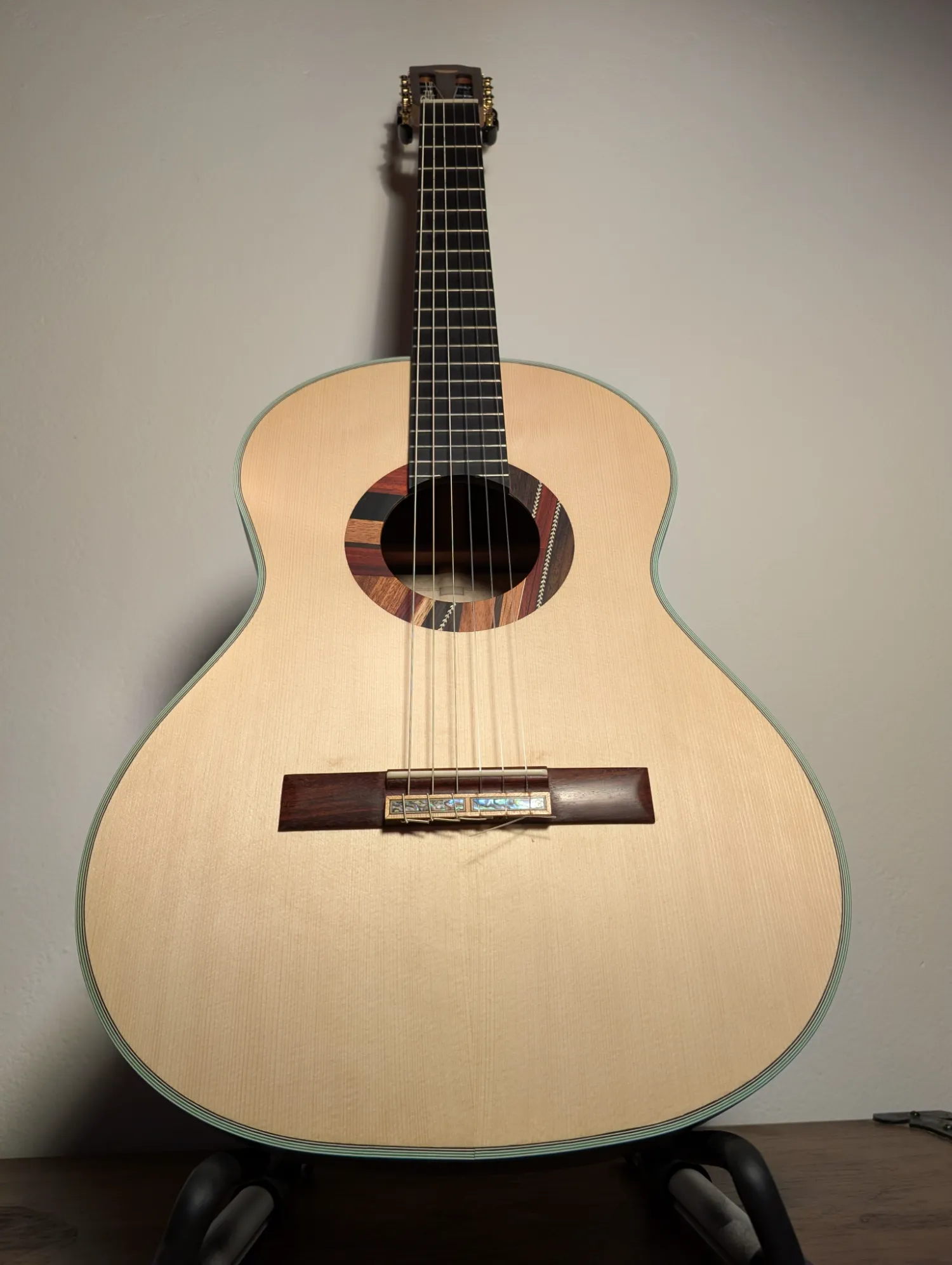 Ulysses handcrafted concert guitar ebony fingerboard close-up