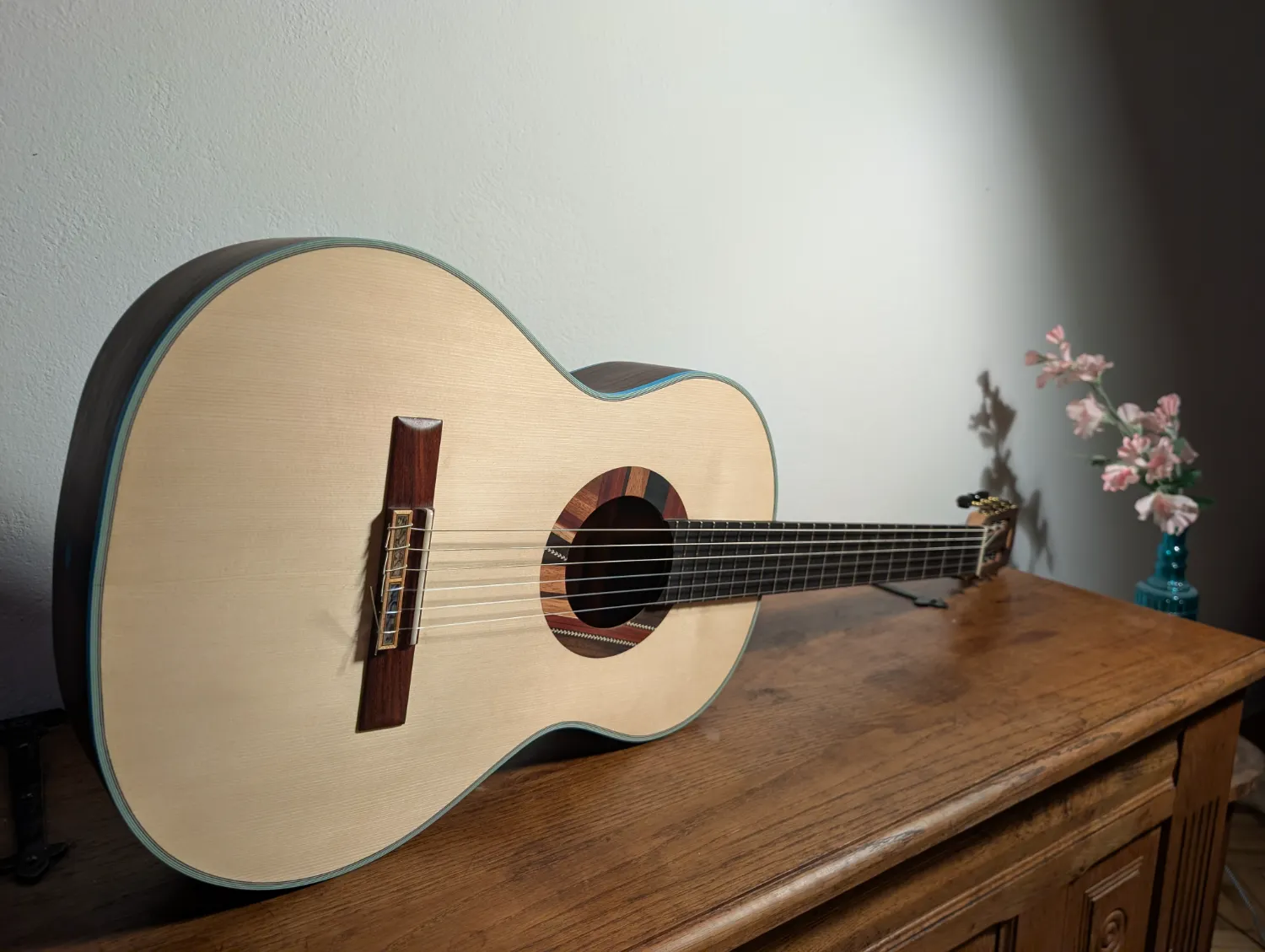 Ulysses concert guitar lower bout and Italian spruce top
