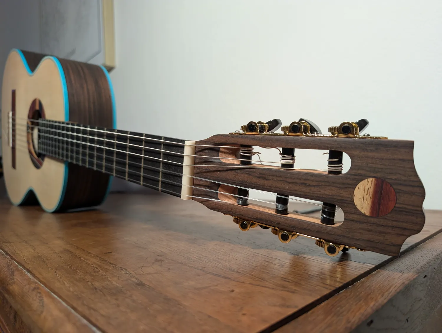 Ulysses Definitive Edition concert guitar three-quarter angle view